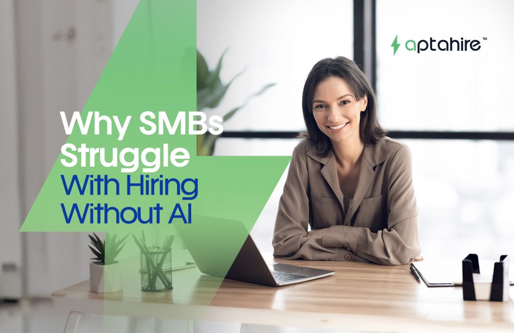 Small business team reviewing resumes manually without AI hiring tools